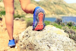Man hiking with legs exposed, showcasing healthy veins in Melbourne